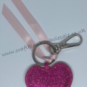 Pink glitter key chain with ribbon detail